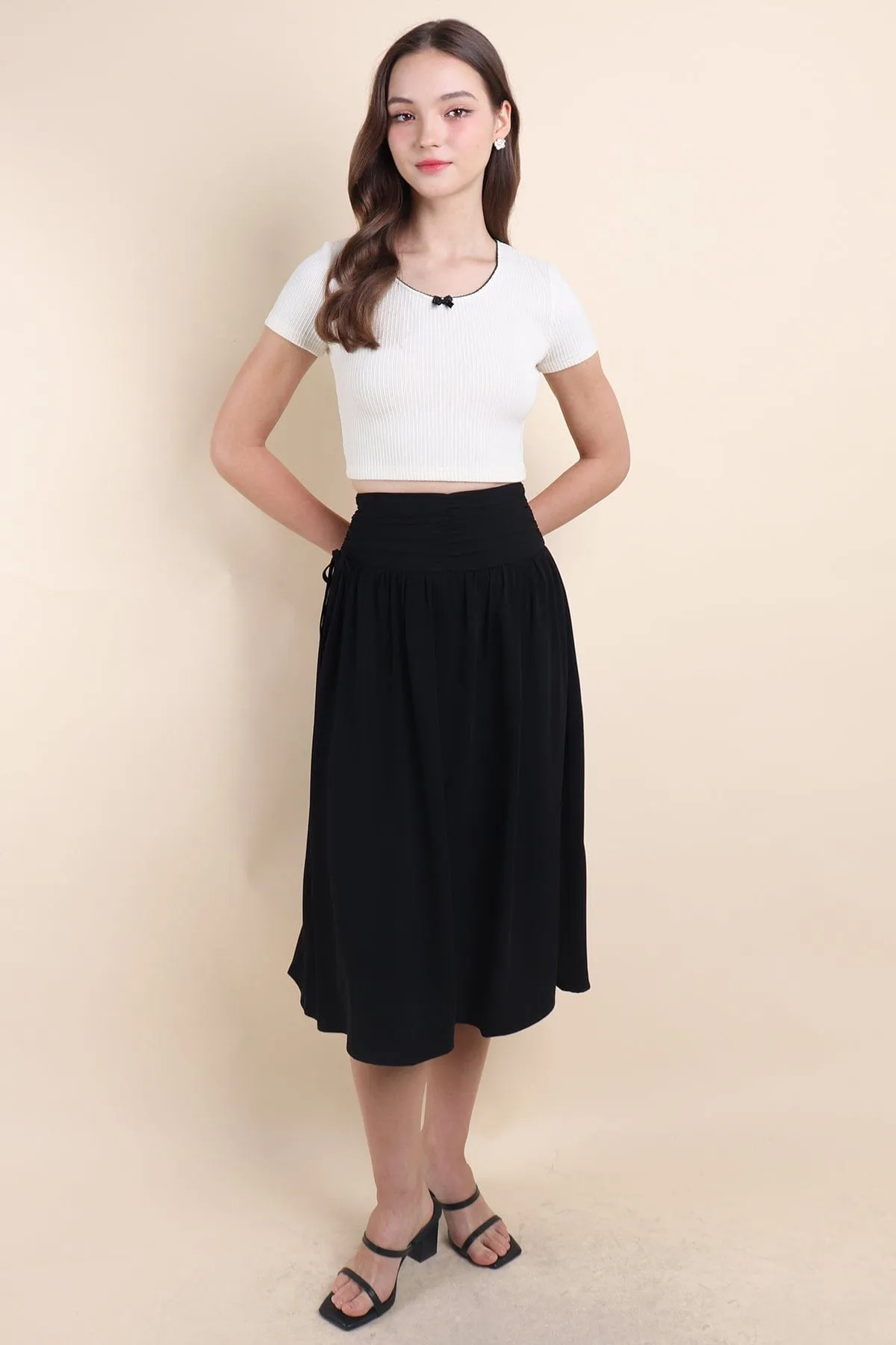 ADORA RUCHED MIDI SKIRT IN BLACK