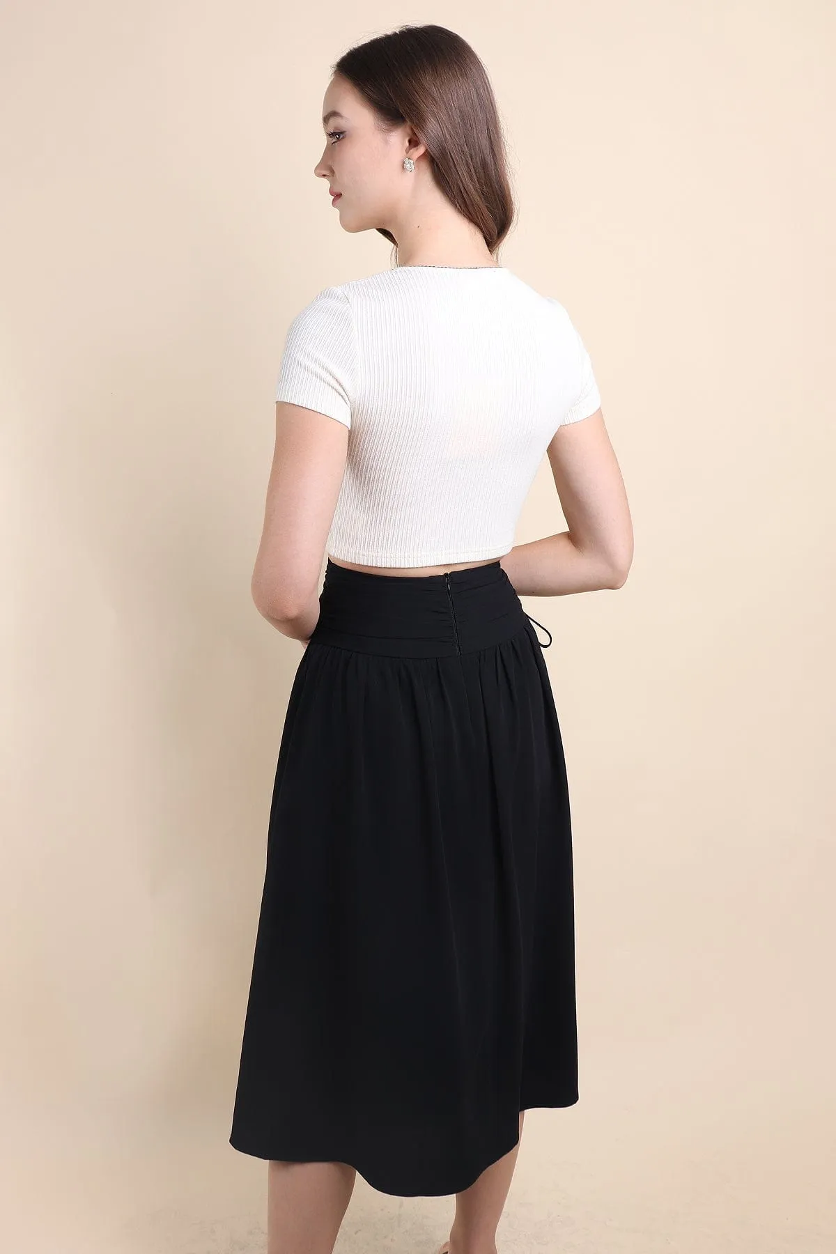 ADORA RUCHED MIDI SKIRT IN BLACK