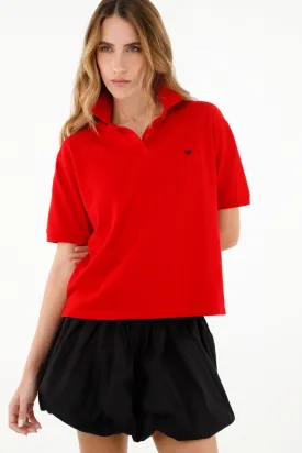 Polo roja con raqueta bordada para mujer